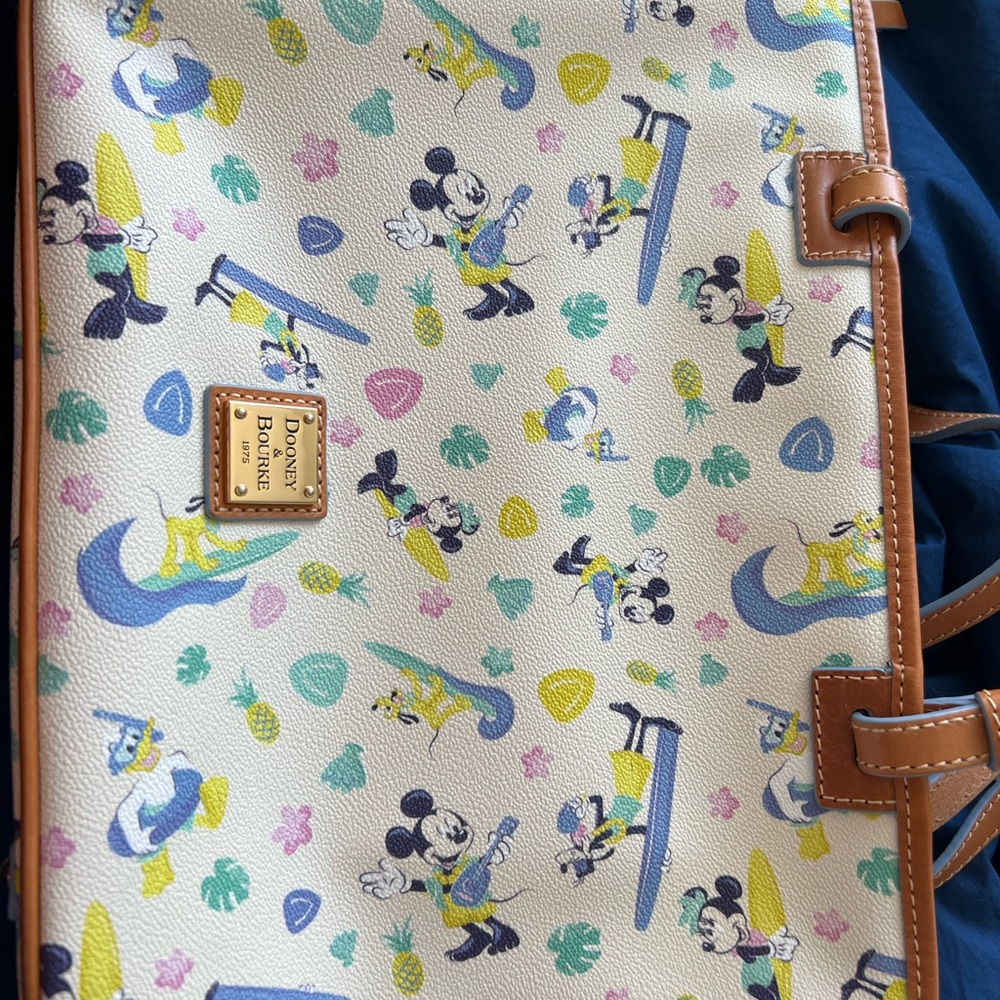 Disney Dooney and Bourke. Fab five gone surfin 2019 Aulani tote.